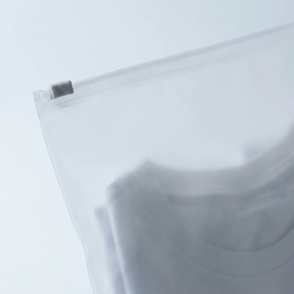 Extreme close view of the frosted matte surface of a PVC zipper bag, with the zip track running across the upper third.